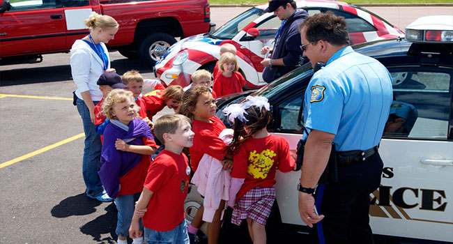 Schoolchildren with police